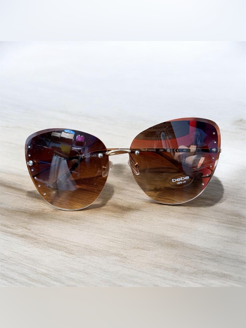 NWT- bebe Brown Gradient Rimless Oversized Sunglasses with Gold Bridge 100 % UV
